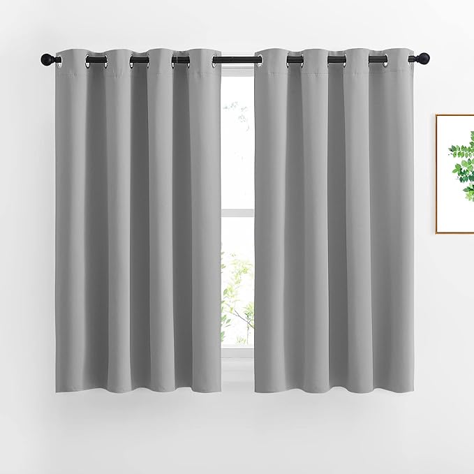 NICETOWN Bedroom Blackout Curtains Panels - Window Treatment Thermal Insulated Solid Grommet Vertical Drapes for Nursery (1 Pair, 52 by 54 Inch, Silver Grey)